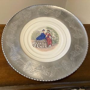 Faberwear aluminum and china serving plate with Victorian scene on the plate.